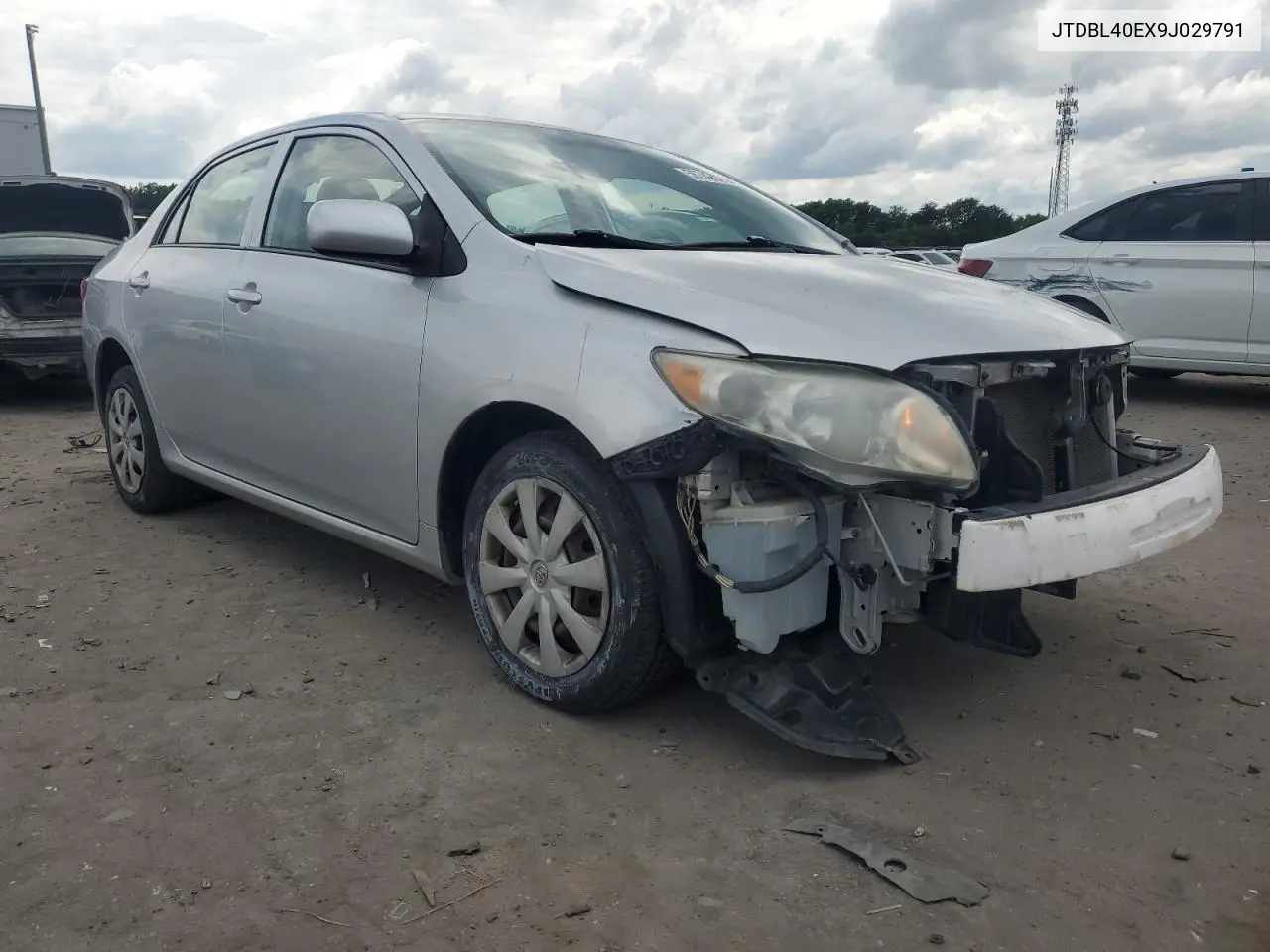 2009 Toyota Corolla Base VIN: JTDBL40EX9J029791 Lot: 56742975