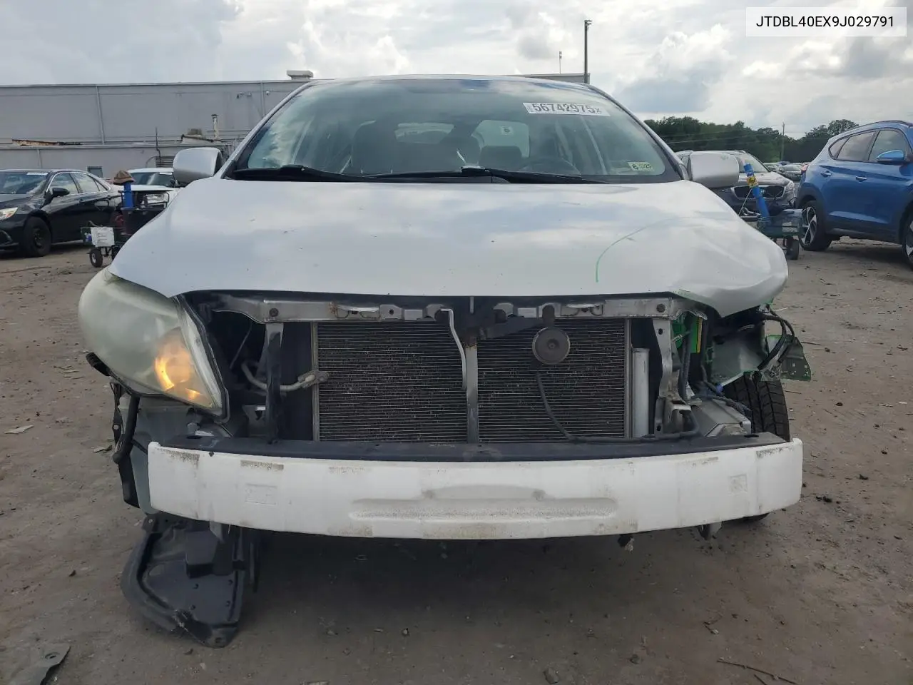 2009 Toyota Corolla Base VIN: JTDBL40EX9J029791 Lot: 56742975