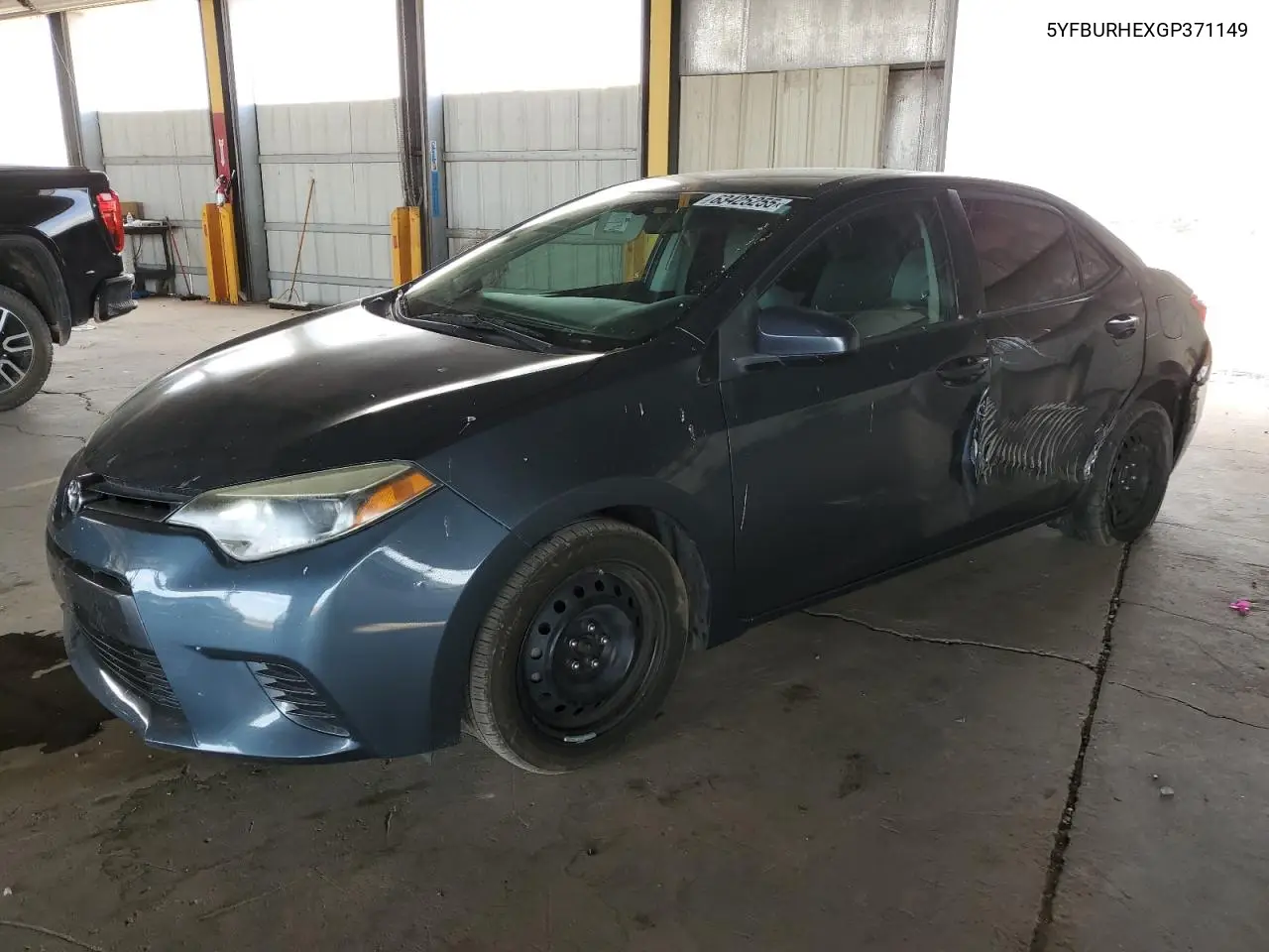 2016 Toyota Corolla L VIN: 5YFBURHEXGP371149 Lot: 63425255