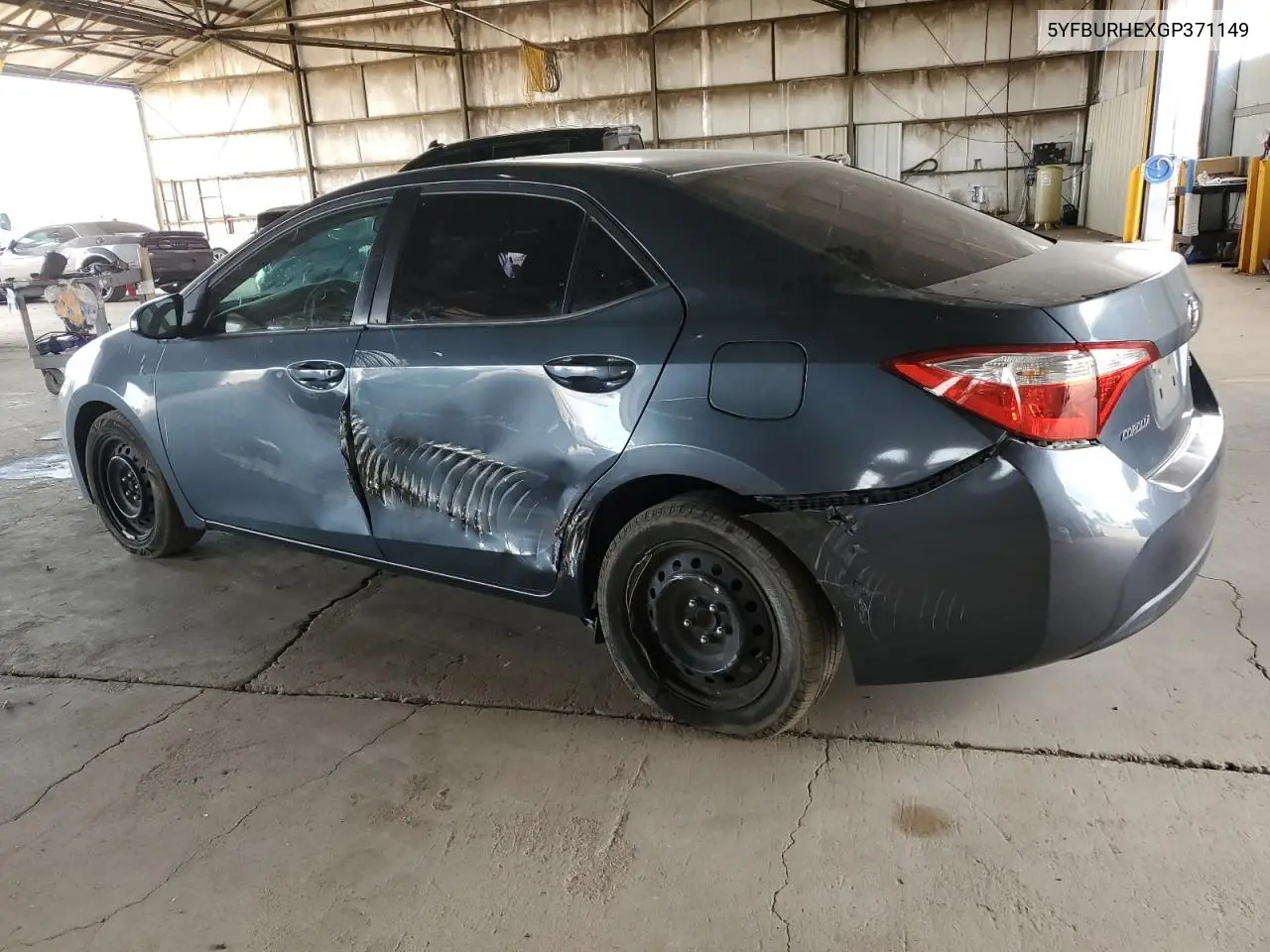 2016 Toyota Corolla L VIN: 5YFBURHEXGP371149 Lot: 63425255