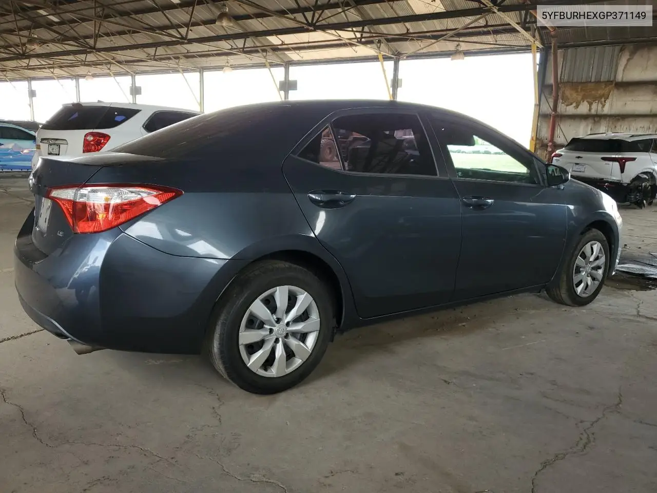 2016 Toyota Corolla L VIN: 5YFBURHEXGP371149 Lot: 63425255