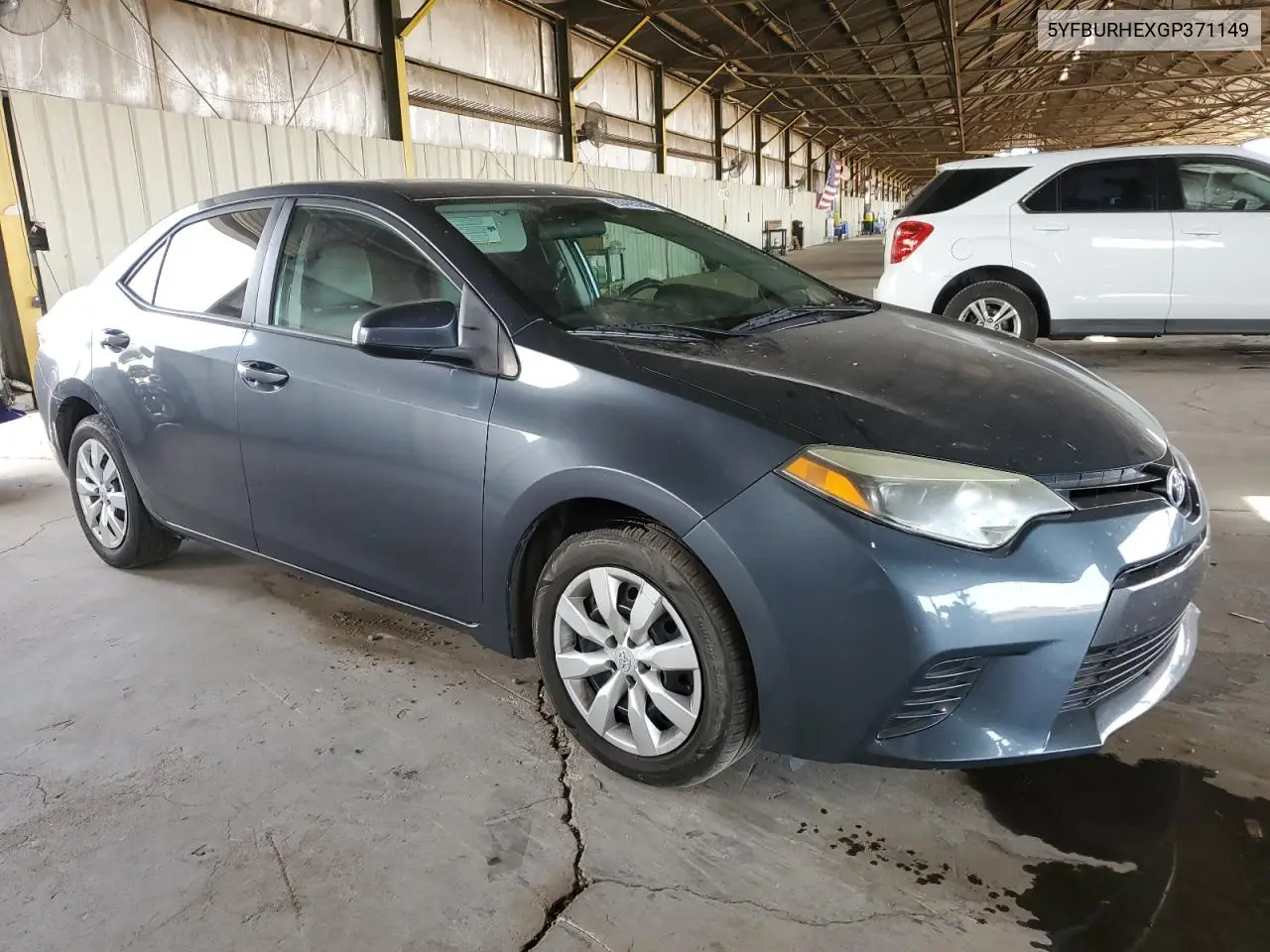 2016 Toyota Corolla L VIN: 5YFBURHEXGP371149 Lot: 63425255