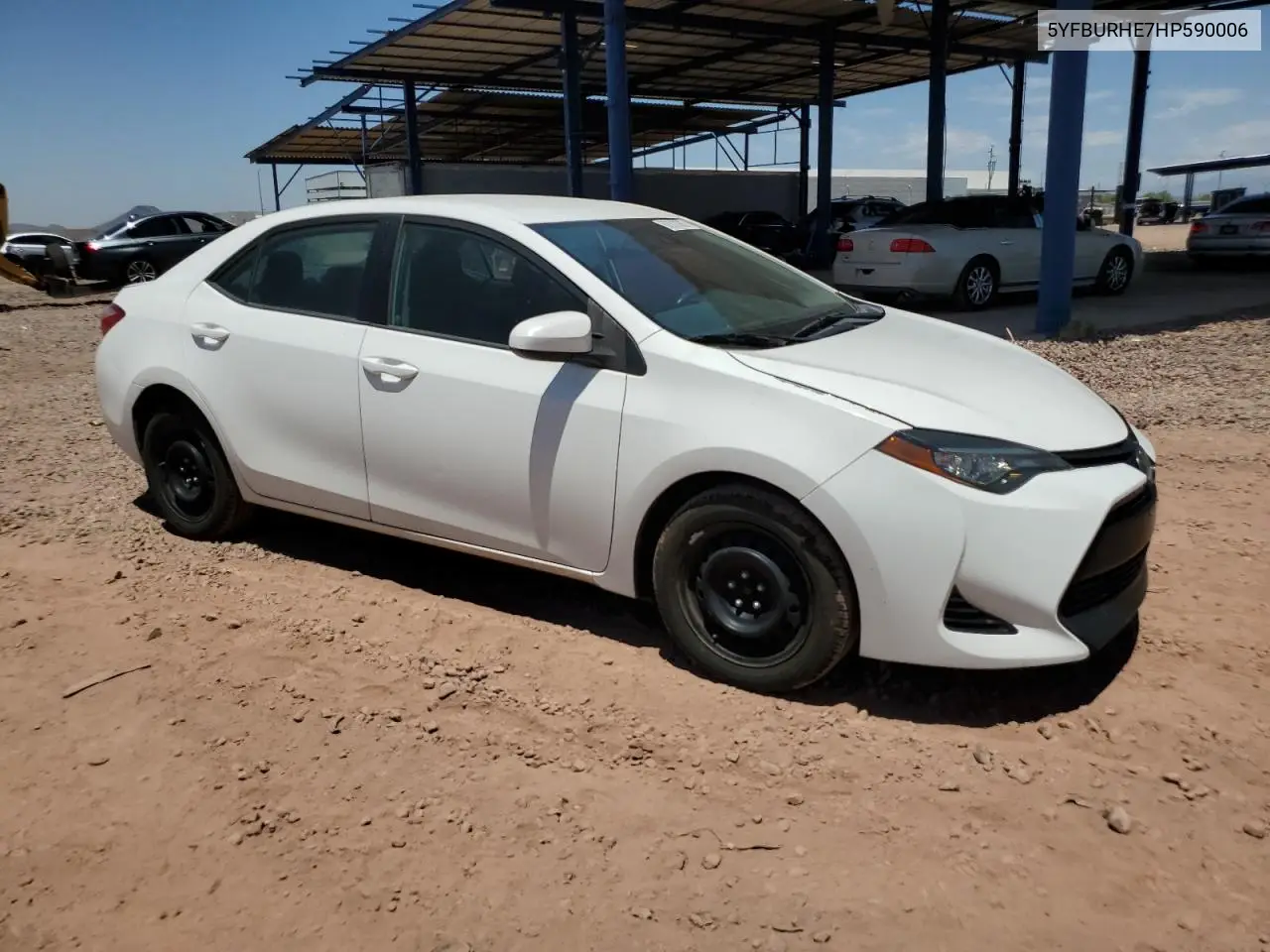 2017 Toyota Corolla L VIN: 5YFBURHE7HP590006 Lot: 62910385