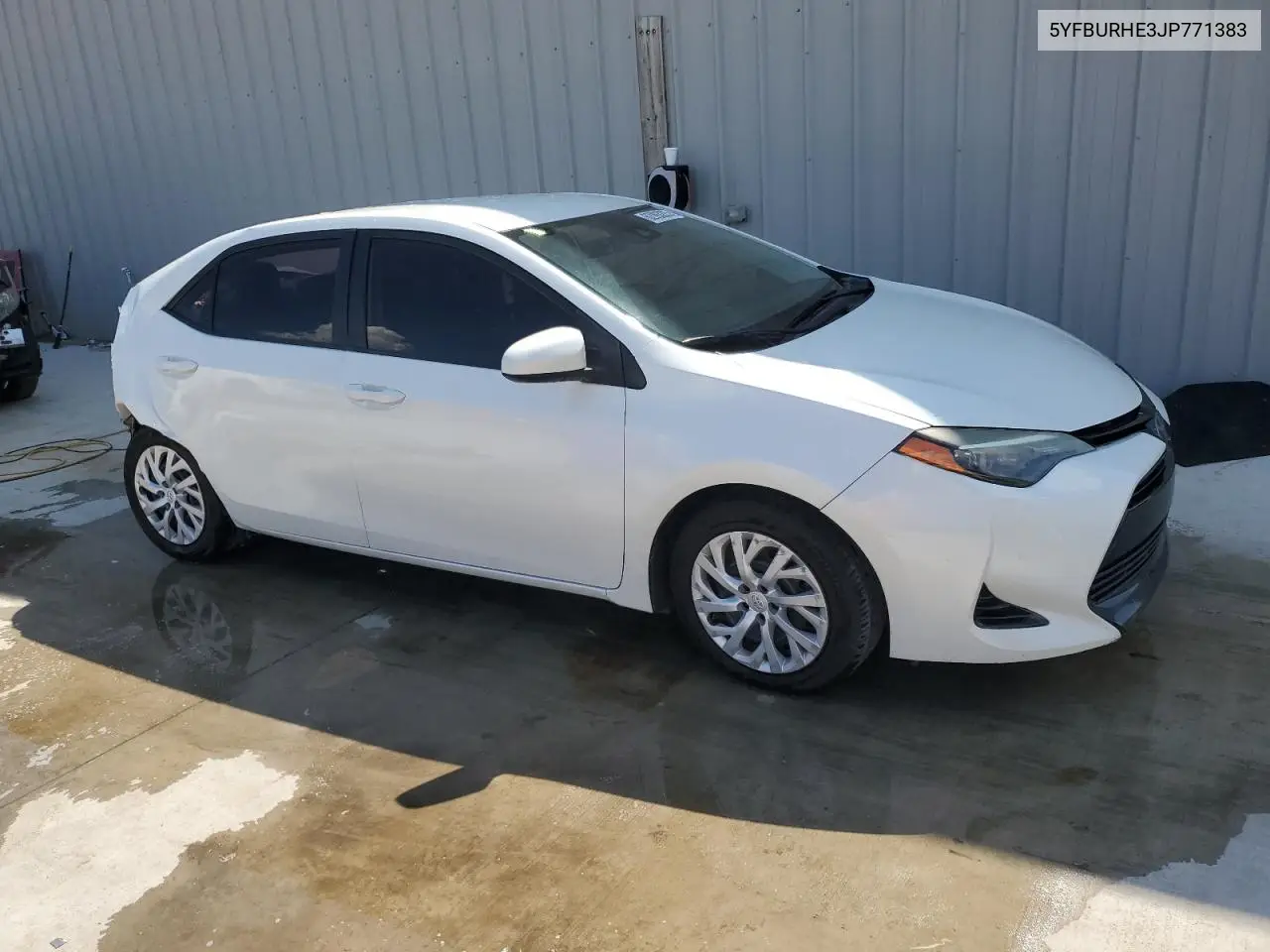 2018 Toyota Corolla L VIN: 5YFBURHE3JP771383 Lot: 62993225