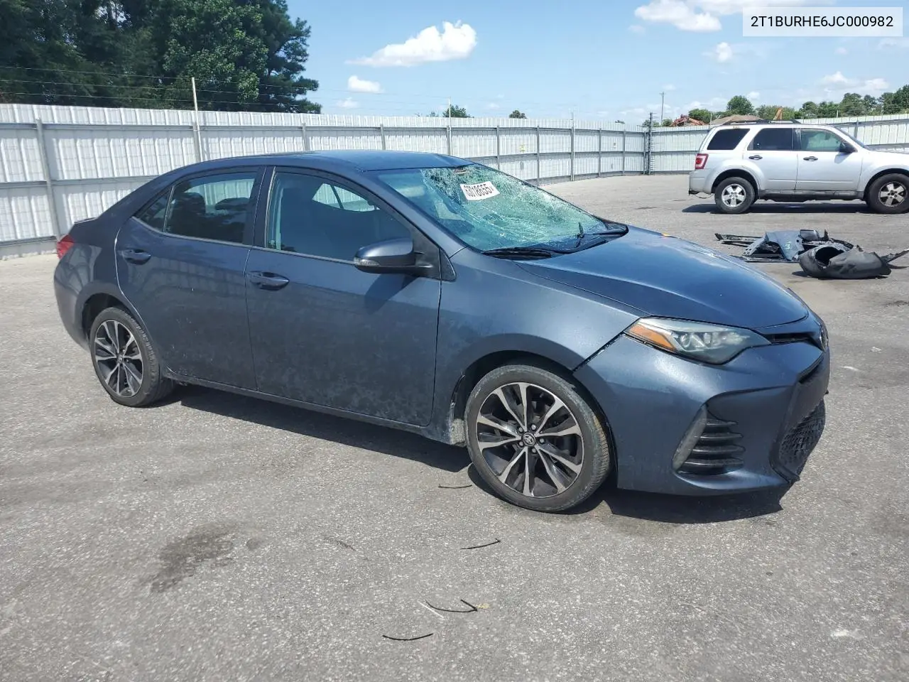 2018 Toyota Corolla L VIN: 2T1BURHE6JC000982 Lot: 63018655