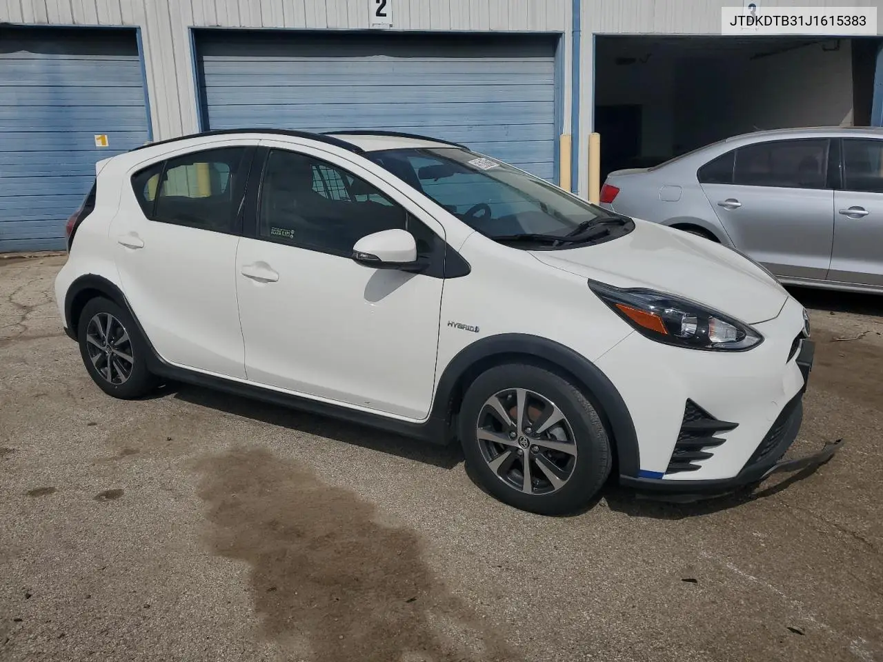 2018 Toyota Prius C VIN: JTDKDTB31J1615383 Lot: 53670125