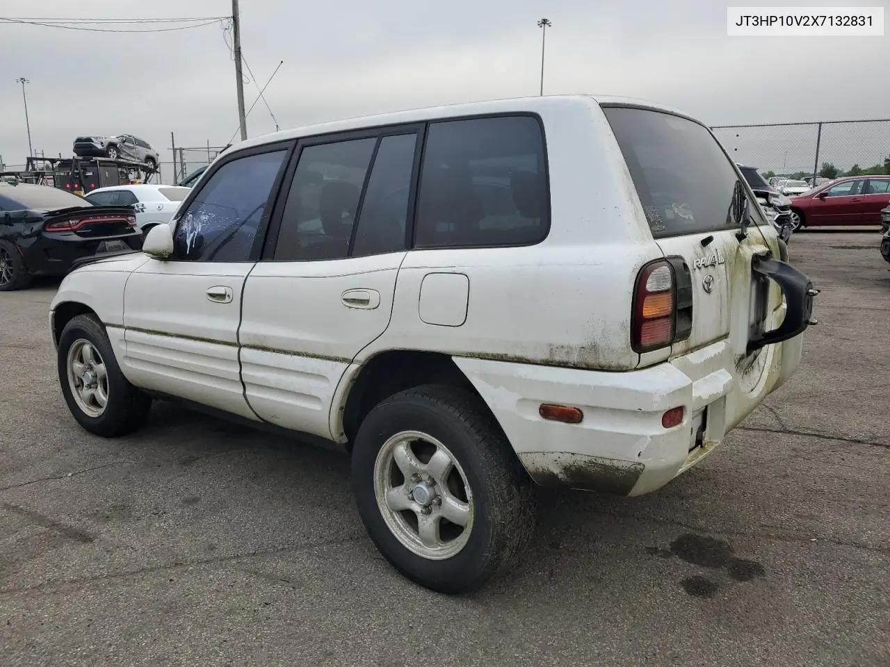 1999 Toyota Rav4 VIN: JT3HP10V2X7132831 Lot: 61091055