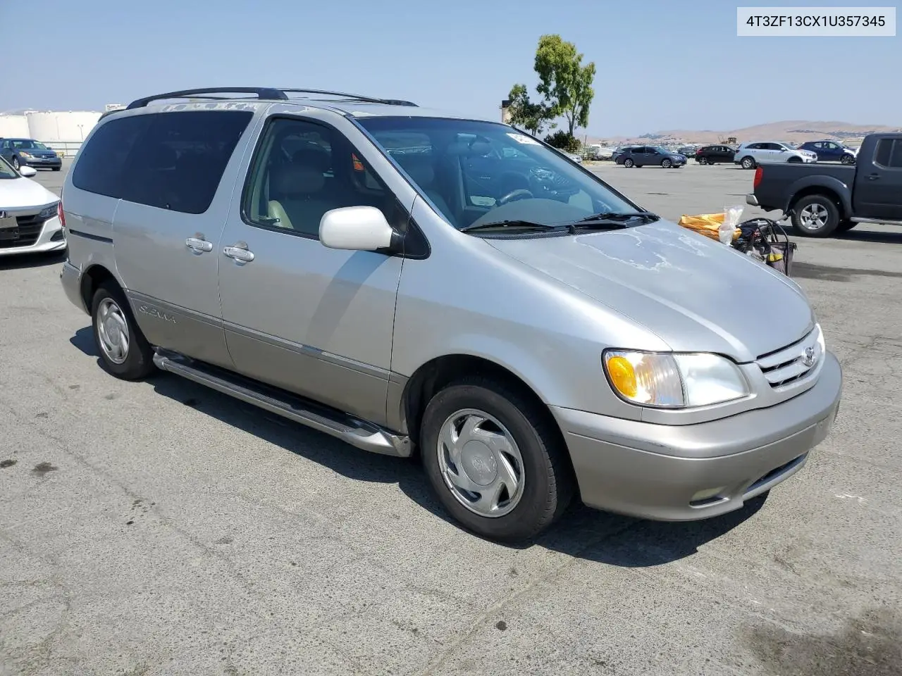 2001 Toyota Sienna Le VIN: 4T3ZF13CX1U357345 Lot: 64207105