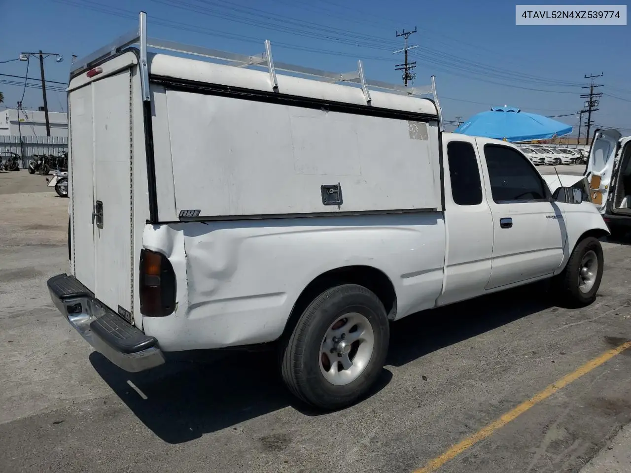 1999 Toyota Tacoma Xtracab VIN: 4TAVL52N4XZ539774 Lot: 62430475