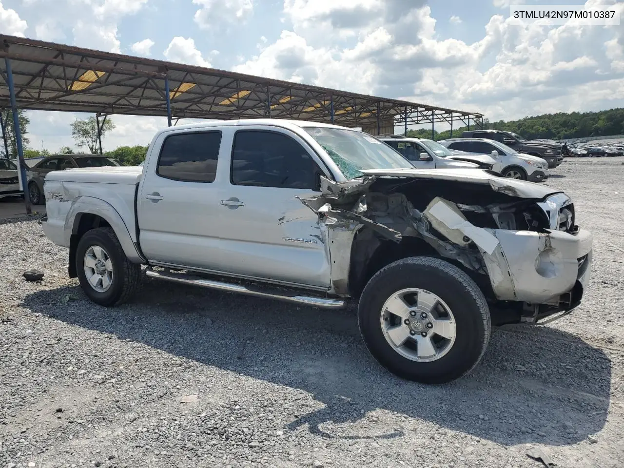 2007 Toyota Tacoma Double Cab VIN: 3TMLU42N97M010387 Lot: 62998445