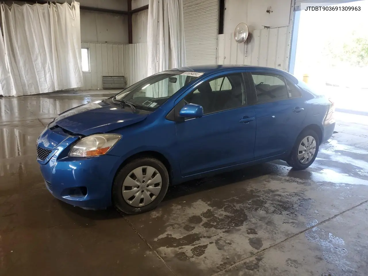 2009 Toyota Yaris VIN: JTDBT903691309963 Lot: 61654095