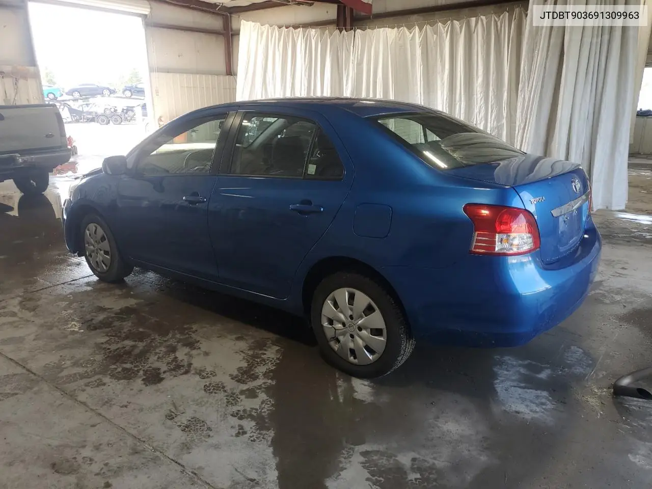 2009 Toyota Yaris VIN: JTDBT903691309963 Lot: 61654095