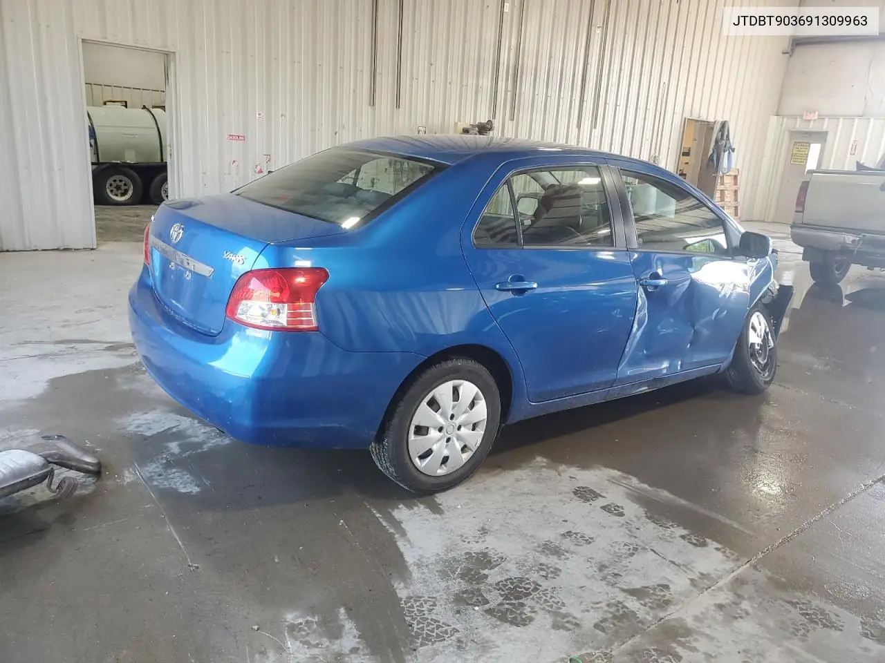 2009 Toyota Yaris VIN: JTDBT903691309963 Lot: 61654095