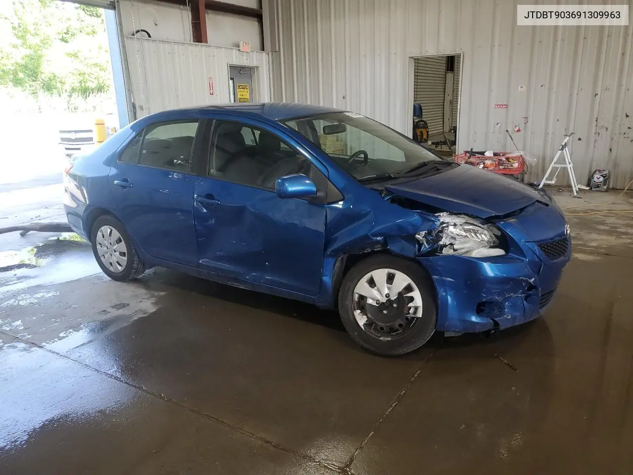 2009 Toyota Yaris VIN: JTDBT903691309963 Lot: 61654095