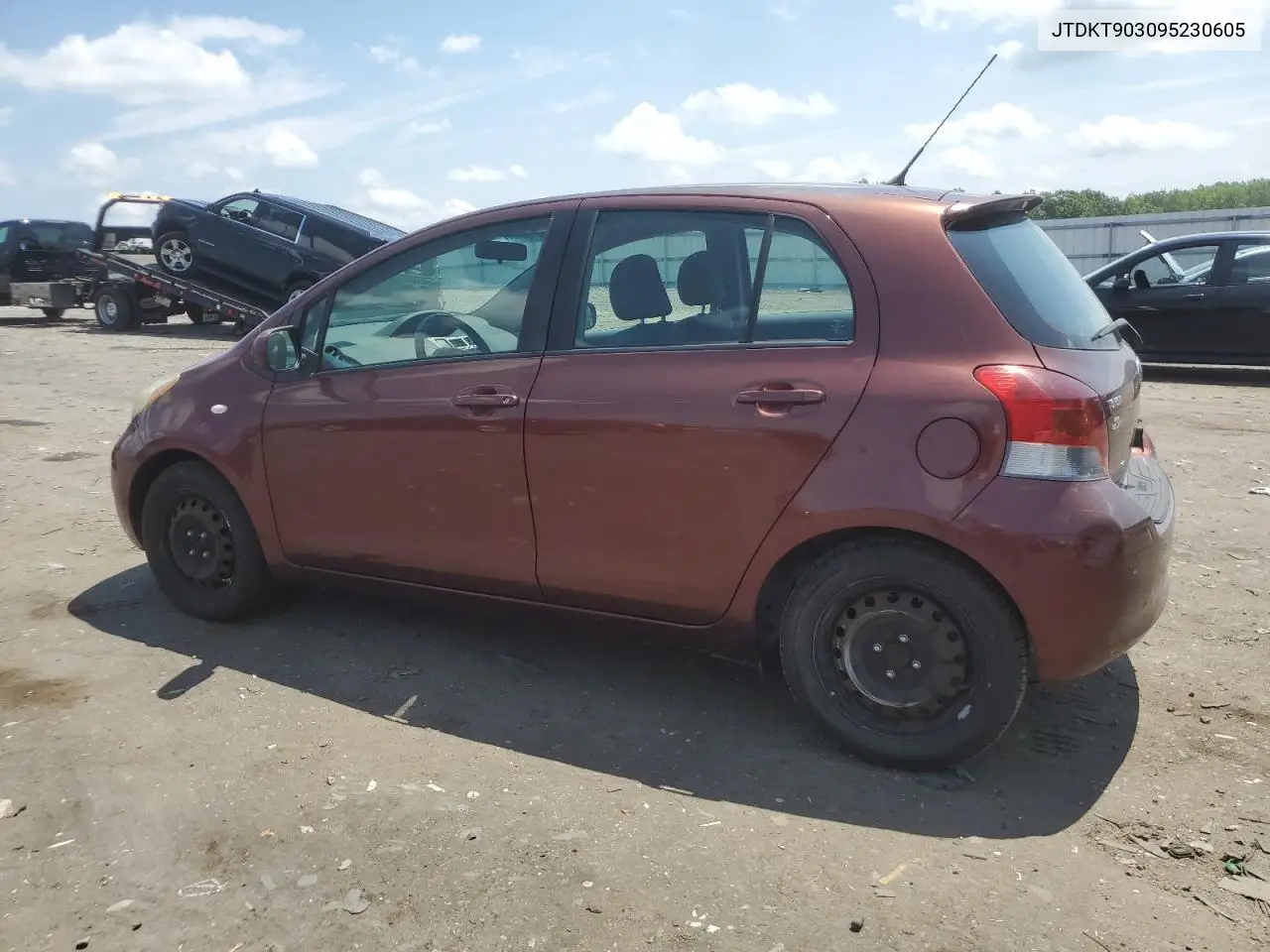 2009 Toyota Yaris VIN: JTDKT903095230605 Lot: 62904075