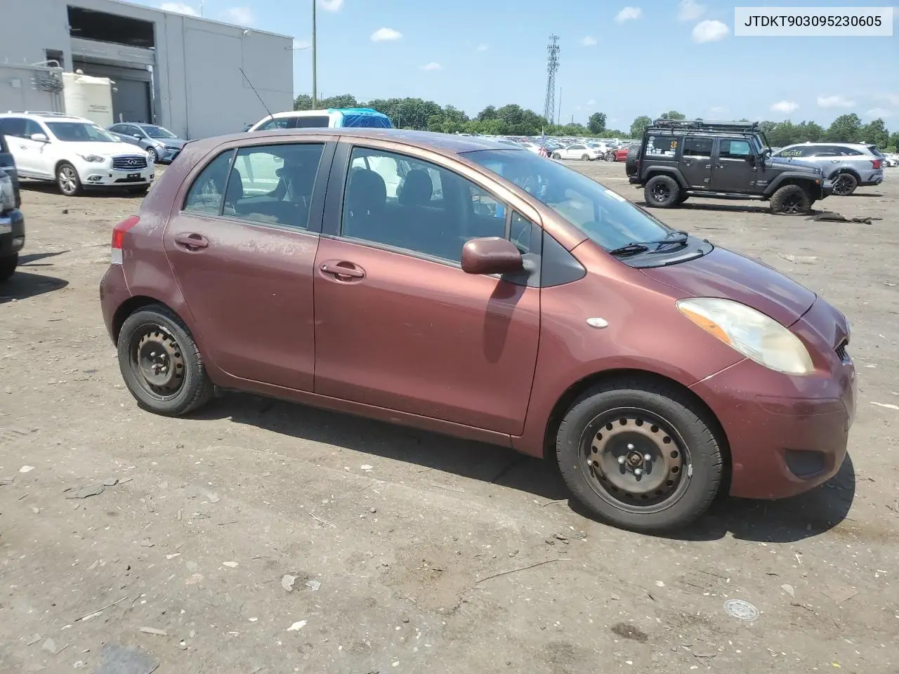 2009 Toyota Yaris VIN: JTDKT903095230605 Lot: 62904075