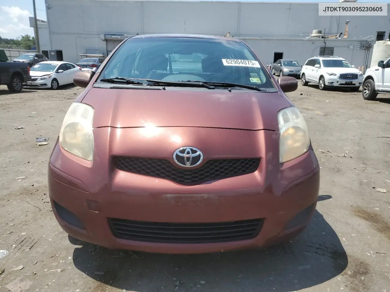 2009 Toyota Yaris VIN: JTDKT903095230605 Lot: 62904075