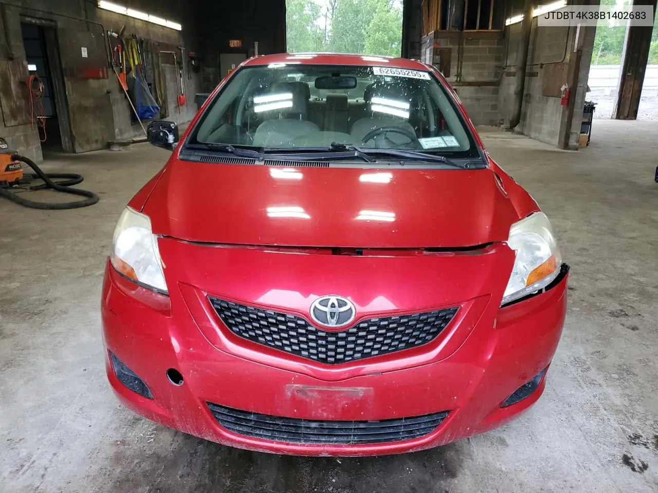 2011 Toyota Yaris VIN: JTDBT4K38B1402683 Lot: 62655255