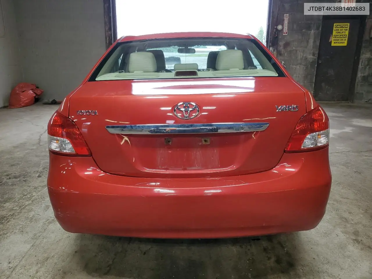 2011 Toyota Yaris VIN: JTDBT4K38B1402683 Lot: 62655255