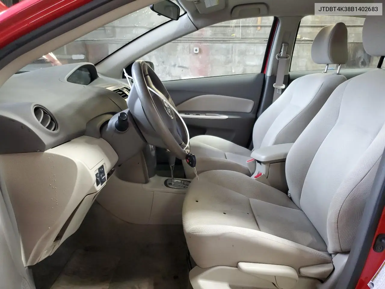 2011 Toyota Yaris VIN: JTDBT4K38B1402683 Lot: 62655255