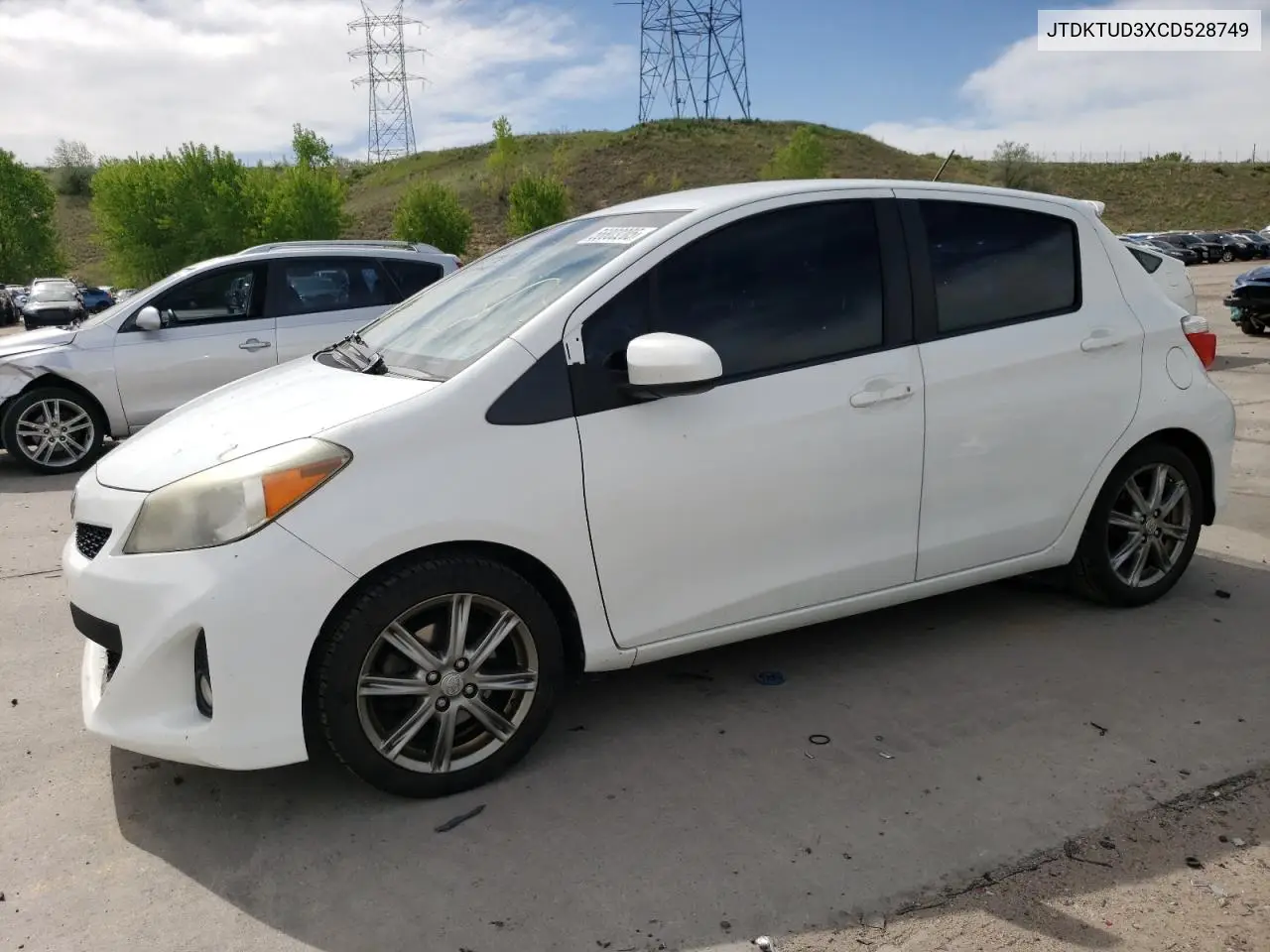 2012 Toyota Yaris VIN: JTDKTUD3XCD528749 Lot: 56803205
