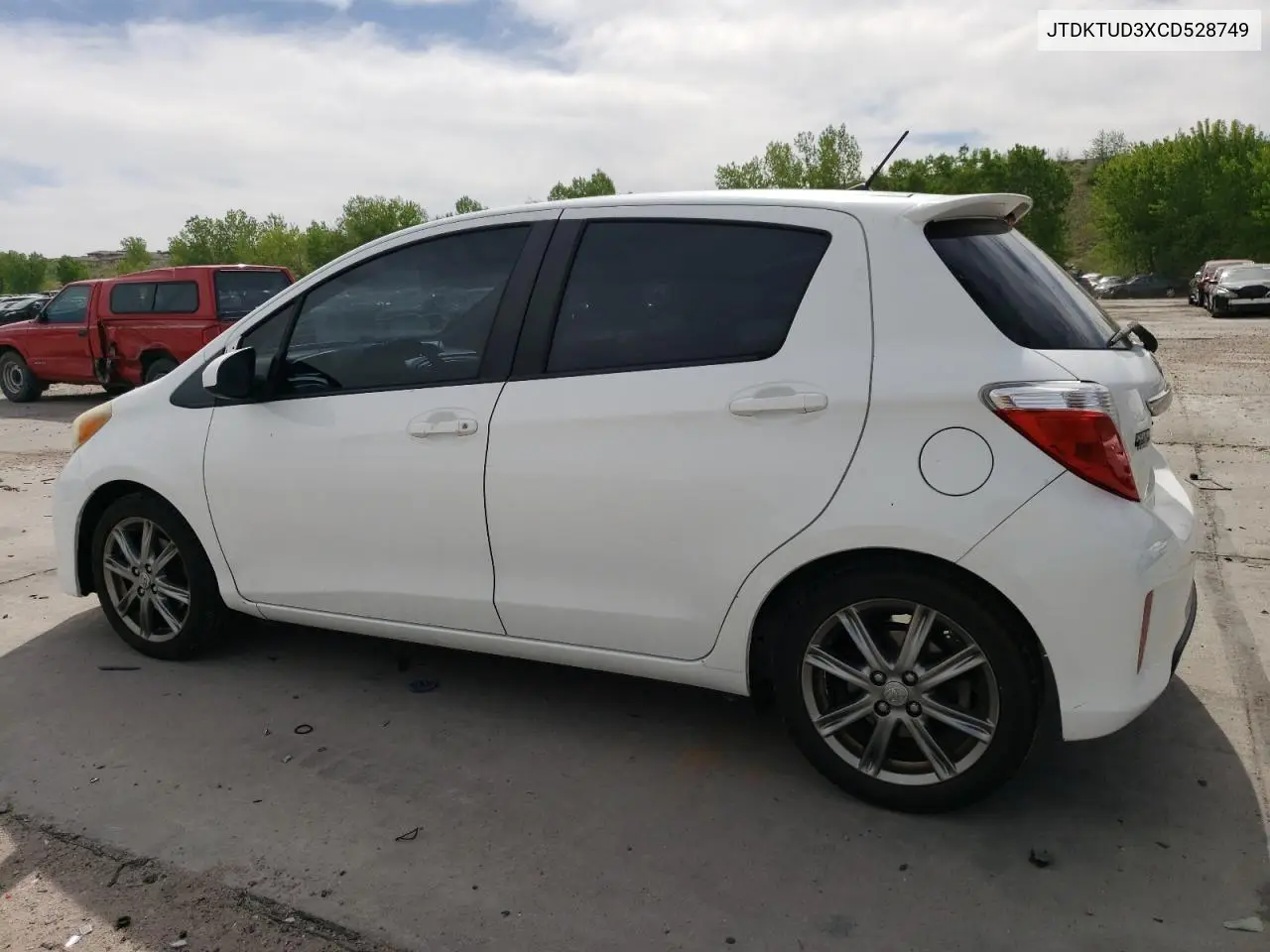 2012 Toyota Yaris VIN: JTDKTUD3XCD528749 Lot: 56803205