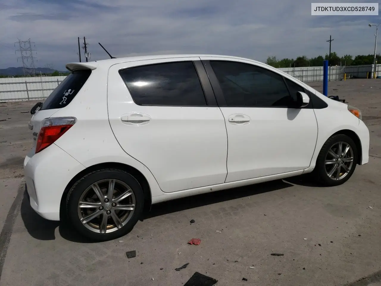2012 Toyota Yaris VIN: JTDKTUD3XCD528749 Lot: 56803205