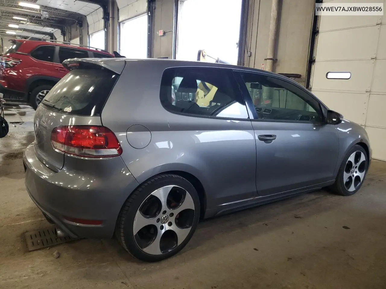 2011 Volkswagen Gti VIN: WVWEV7AJXBW028556 Lot: 62428855