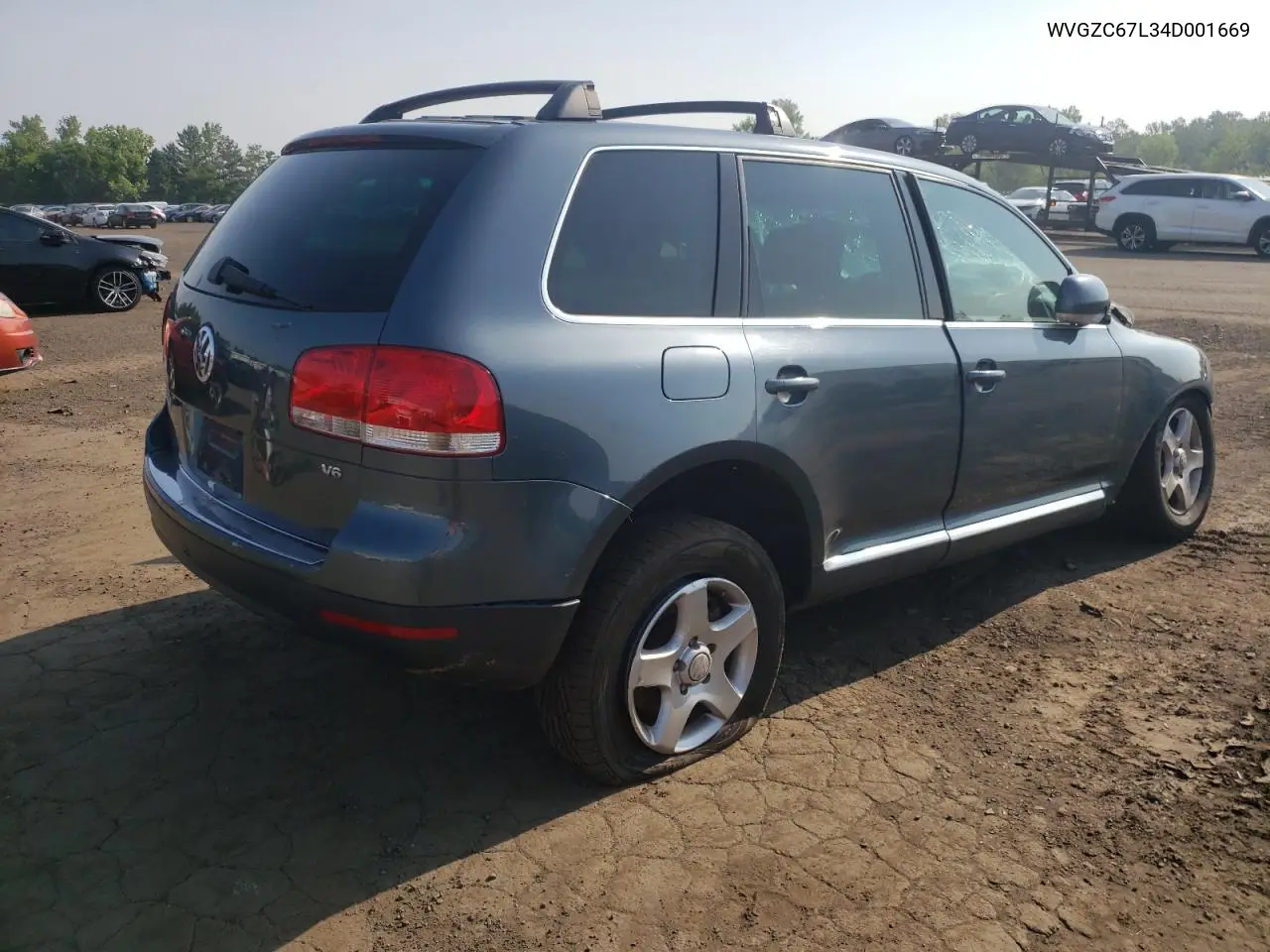2004 Volkswagen Touareg 3.2 VIN: WVGZC67L34D001669 Lot: 58961755