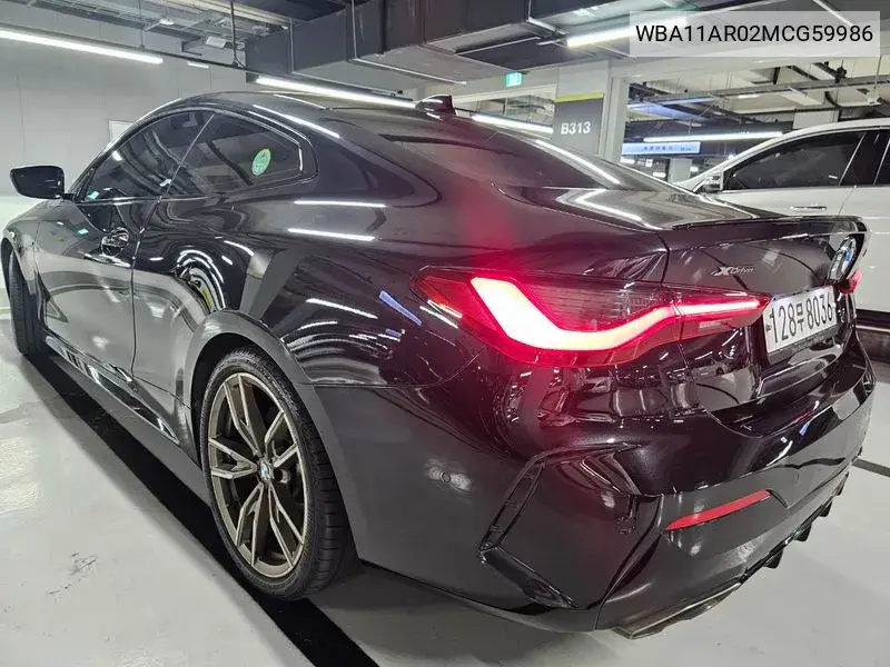 4 Series (G22) M440I xDrive Coupe VIN: WBA11AR02MCG59986 Lot: 39970652