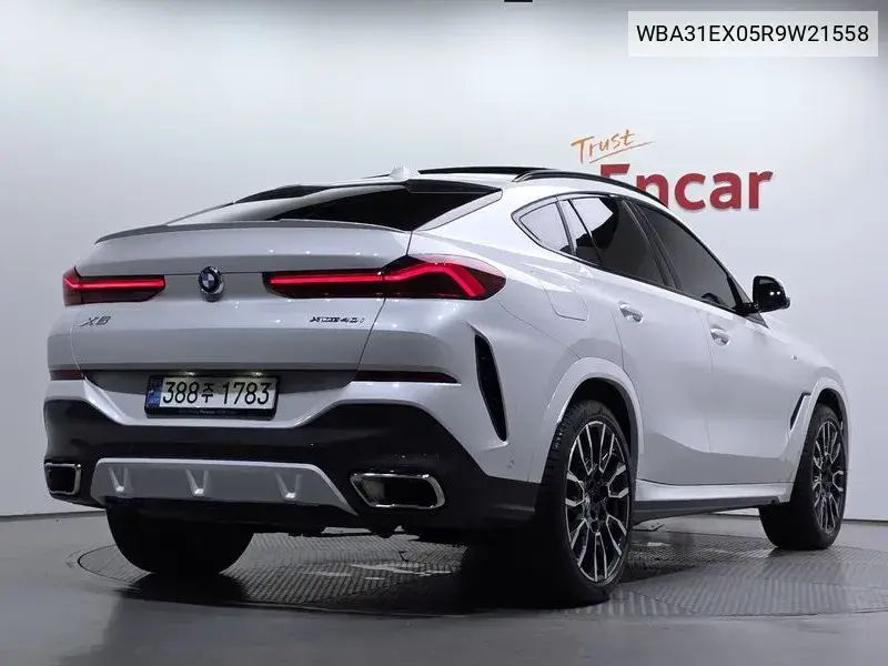 X6 (G06) xDrive40I M Sports VIN: WBA31EX05R9W21558 Lot: 40093041