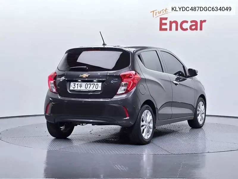 The Next Spark Ltz VIN: KLYDC487DGC634049 Lot: 39974230