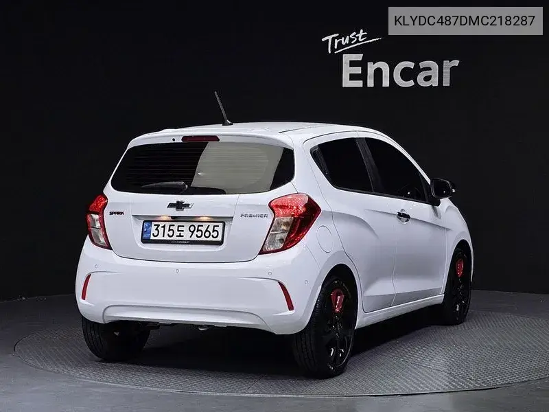 The New Spark Red Fit Edition VIN: KLYDC487DMC218287 Lot: 39960988