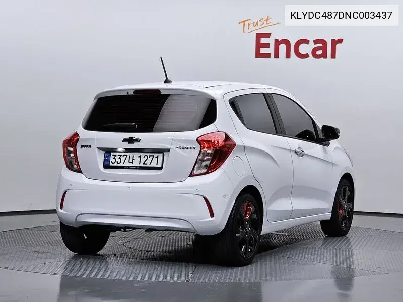 The New Spark Red Fit Edition VIN: KLYDC487DNC003437 Lot: 40059052