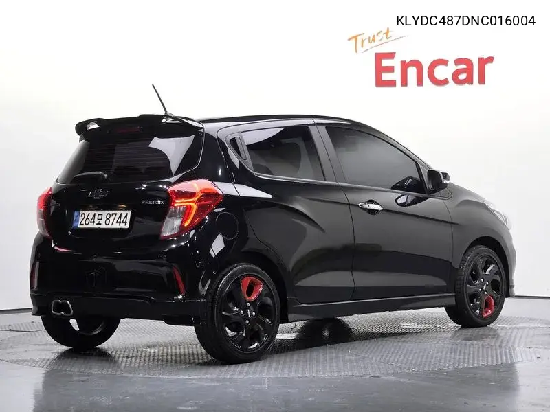The New Spark Red Fit Edition VIN: KLYDC487DNC016004 Lot: 39983265