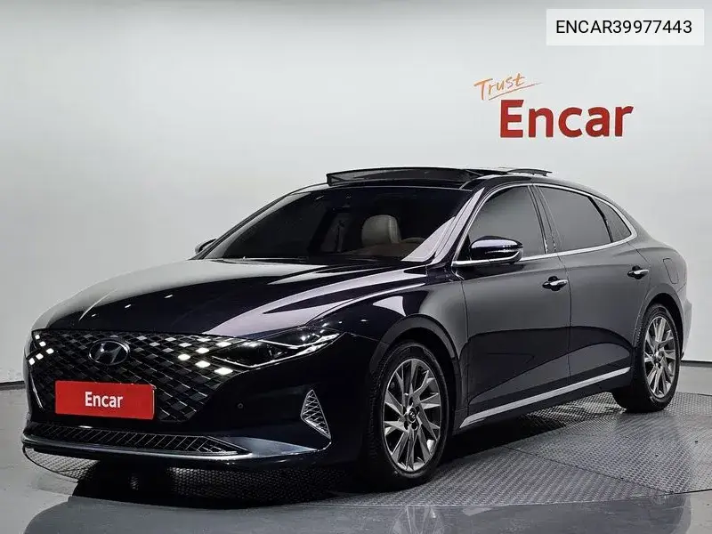 The New Grandeur Ig Hybrid Calligraphy VIN: ENCAR39977443 Lot: 39977443