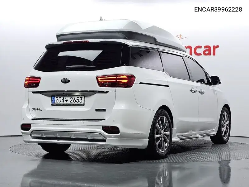 The New Carnival Gasoline 9 -Seater High Rimmujin Noblesse Special VIN: ENCAR39962228 Lot: 39962228