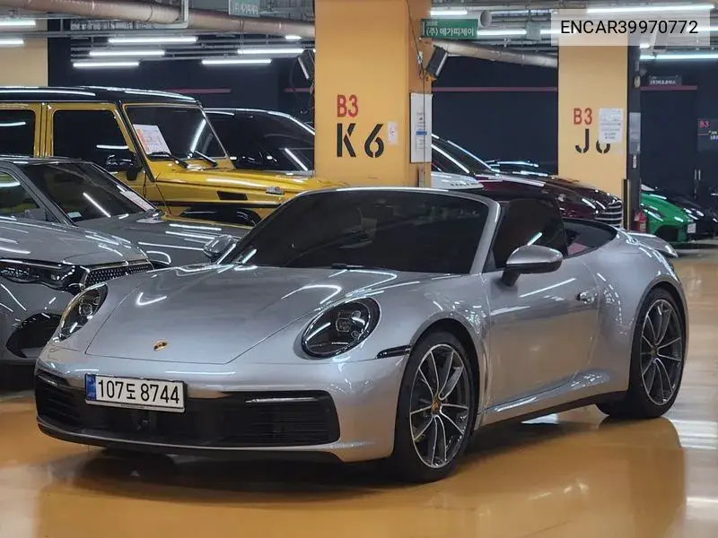 911 (992) Carrera 4 Cabriolet VIN: ENCAR39970772 Lot: 39970772