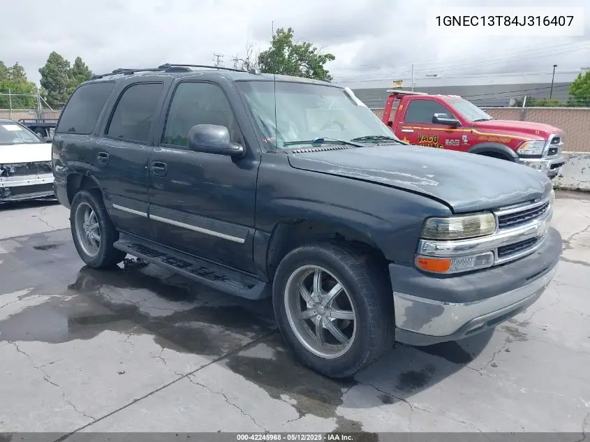 2004 Chevrolet Tahoe Lt VIN: 1GNEC13T84J316407 Lot: 42245968