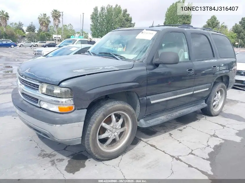 2004 Chevrolet Tahoe Lt VIN: 1GNEC13T84J316407 Lot: 42245968