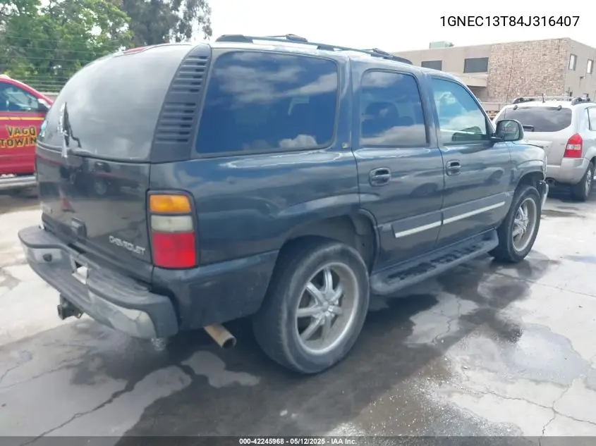 2004 Chevrolet Tahoe Lt VIN: 1GNEC13T84J316407 Lot: 42245968
