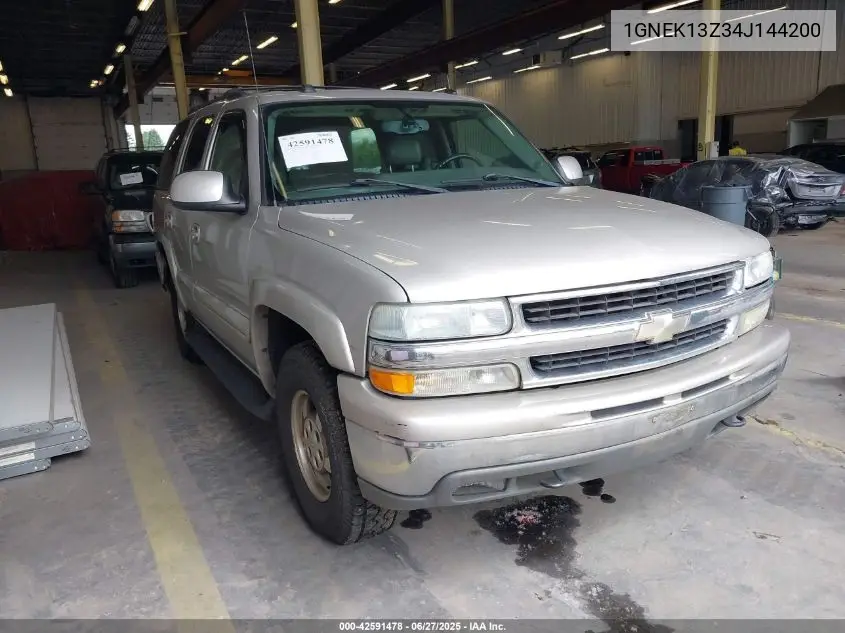 2004 Chevrolet Tahoe Lt VIN: 1GNEK13Z34J144200 Lot: 42591478