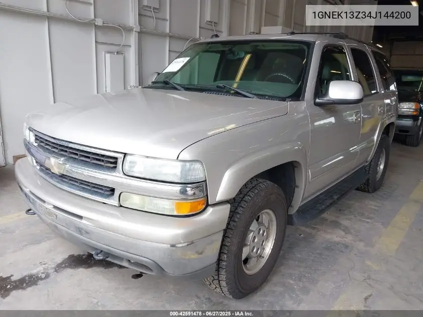 2004 Chevrolet Tahoe Lt VIN: 1GNEK13Z34J144200 Lot: 42591478