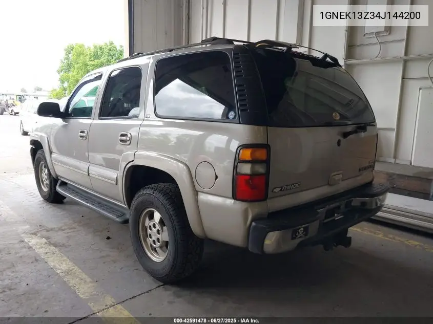 2004 Chevrolet Tahoe Lt VIN: 1GNEK13Z34J144200 Lot: 42591478