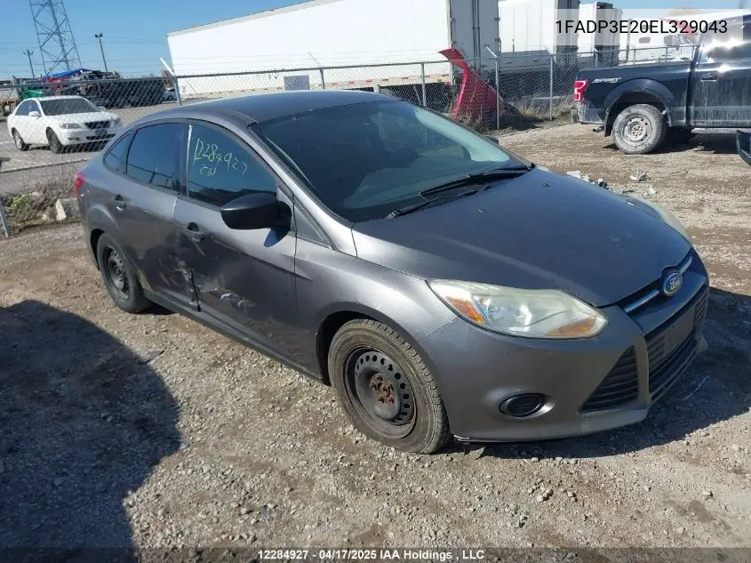 2014 Ford Focus VIN: 1FADP3E20EL329043 Lot: 12284927