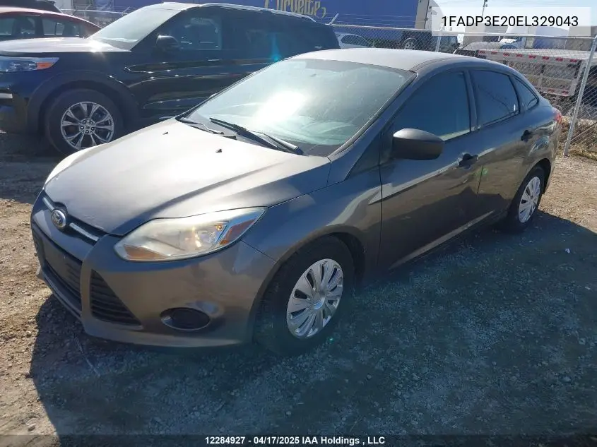 2014 Ford Focus VIN: 1FADP3E20EL329043 Lot: 12284927