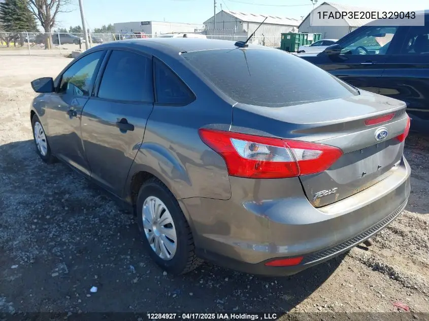 2014 Ford Focus VIN: 1FADP3E20EL329043 Lot: 12284927