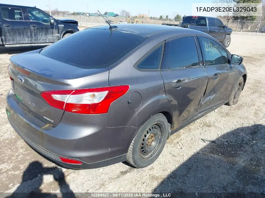 2014 Ford Focus VIN: 1FADP3E20EL329043 Lot: 12284927