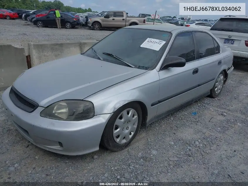 1999 Honda Civic Lx VIN: 1HGEJ6678XL034062 Lot: 42622532