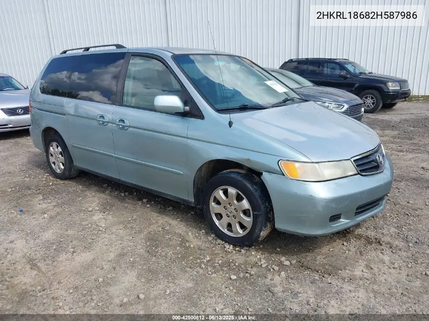 2002 Honda Odyssey Ex VIN: 2HKRL18682H587986 Lot: 42500812